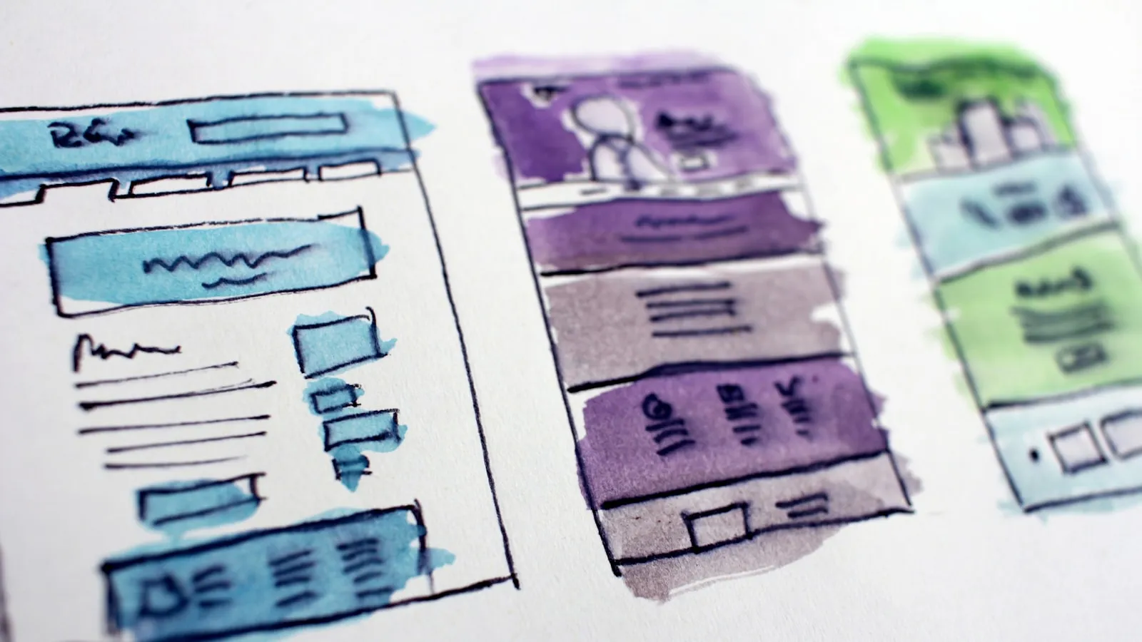 Watercolor sketches of website wireframes — the planning stage (photo Hal Gatewood / Unsplash)